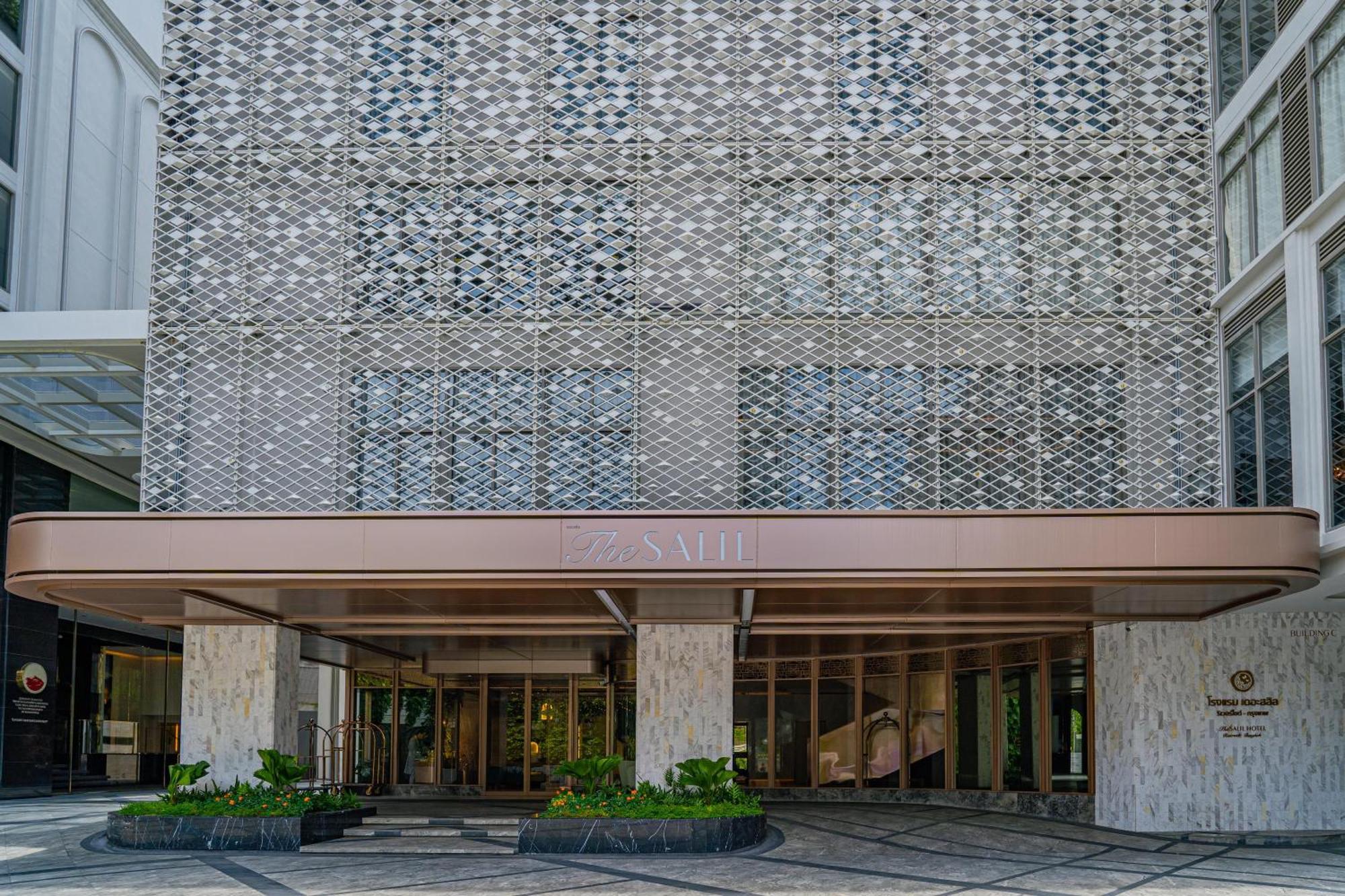 The Salil Hotel Riverside בנגקוק מראה חיצוני תמונה Entrance of the hotel