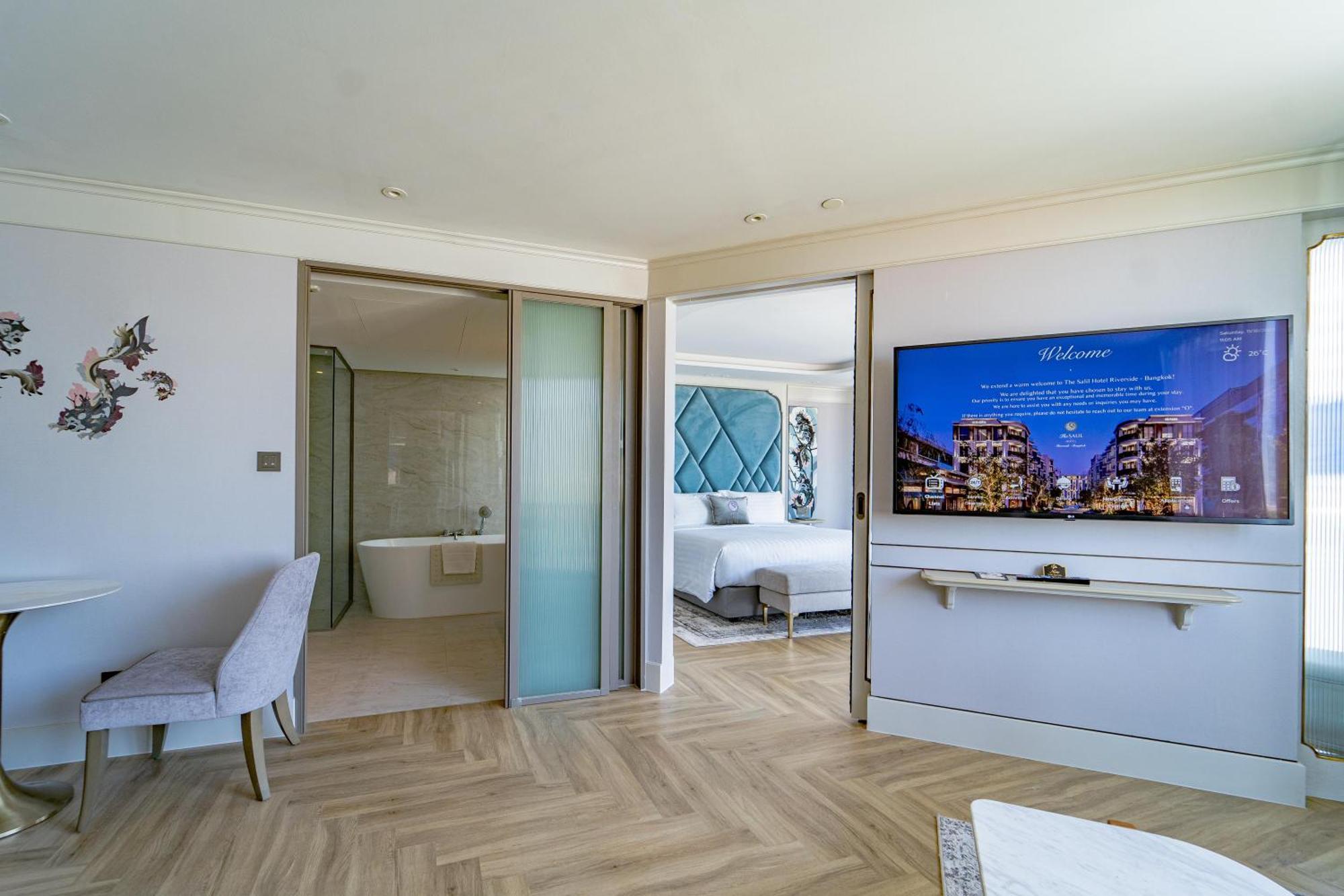 The Salil Hotel Riverside בנגקוק מראה חיצוני תמונה A suite at the hotel